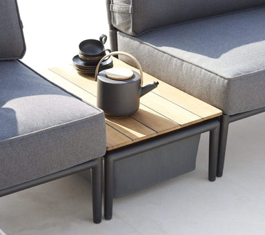 Boxhill's Conic Box Outdoor Storage Table lifestyle image with coffee pot, plates and cups