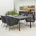 Boxhill's Drop Outdoor Dining Table Lava Grey lifestyle image with dining chair and Drop Outdoor Kitchen Module