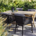 Boxhill's Flip Folding Outdoor Teak Dining Table Large lifestyle with 4 dining chairs beside the plants at patio