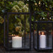 Boxhill's Lighthouse Outdoor Large Aluminum Lantern for Candles | Set of 2 lifestyle image beside the plants