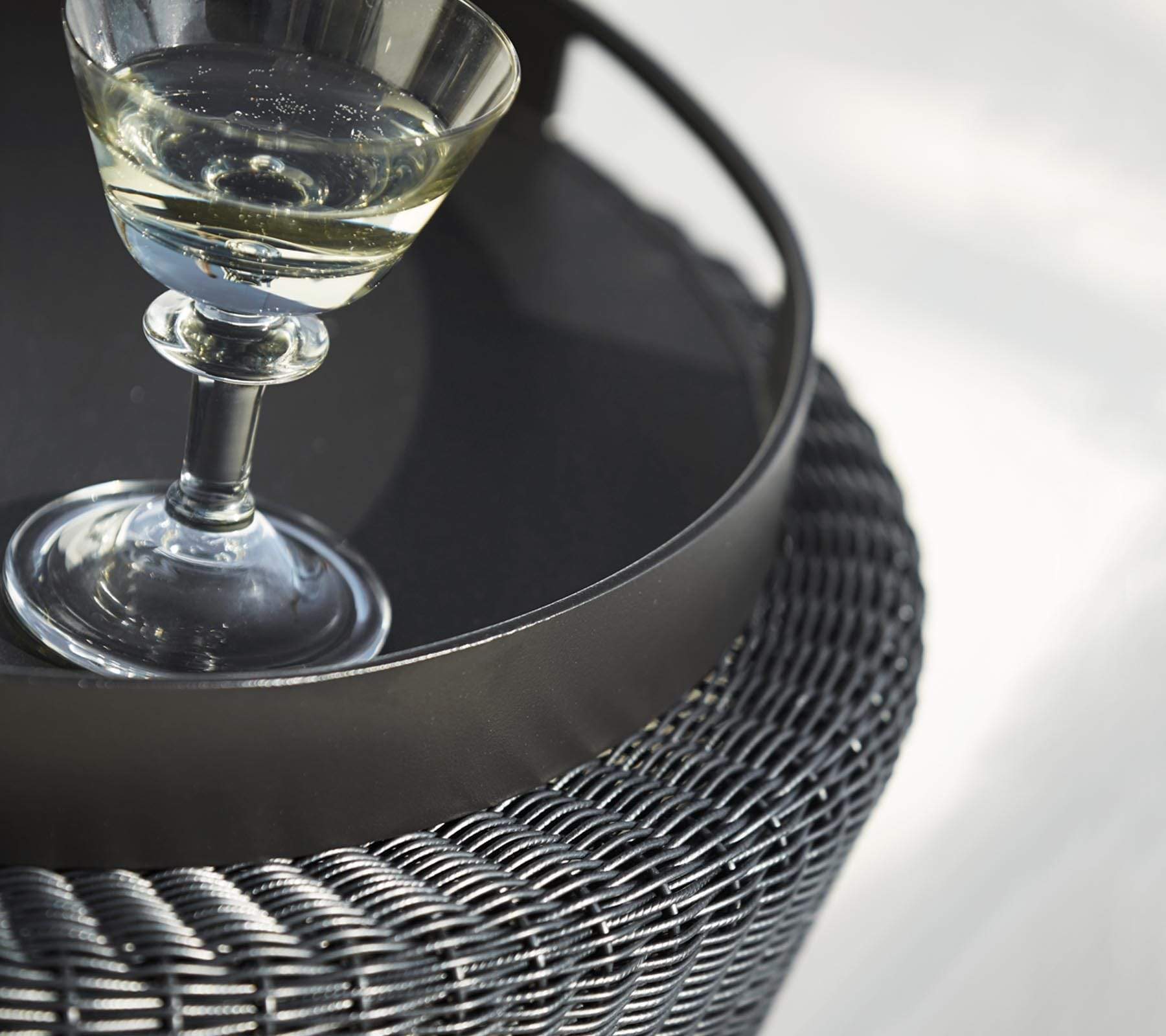 Boxhill's Kingston Outdoor Footstool | Side Table lifestyle image close up view with Club Outdoor Round Tray and a glass of wine