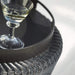 Boxhill's Kingston Outdoor Footstool | Side Table lifestyle image close up view with Club Outdoor Round Tray and a glass of wine