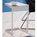 Boxhill's Time-Out white outdoor side table with white cups on it